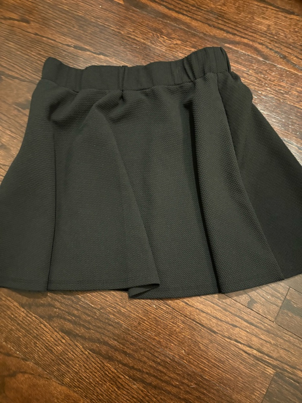 Black Textured Pleated Mini Skirt